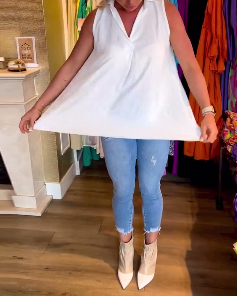 Anabella – Sleeveless Top with Ruffles and Lapels
