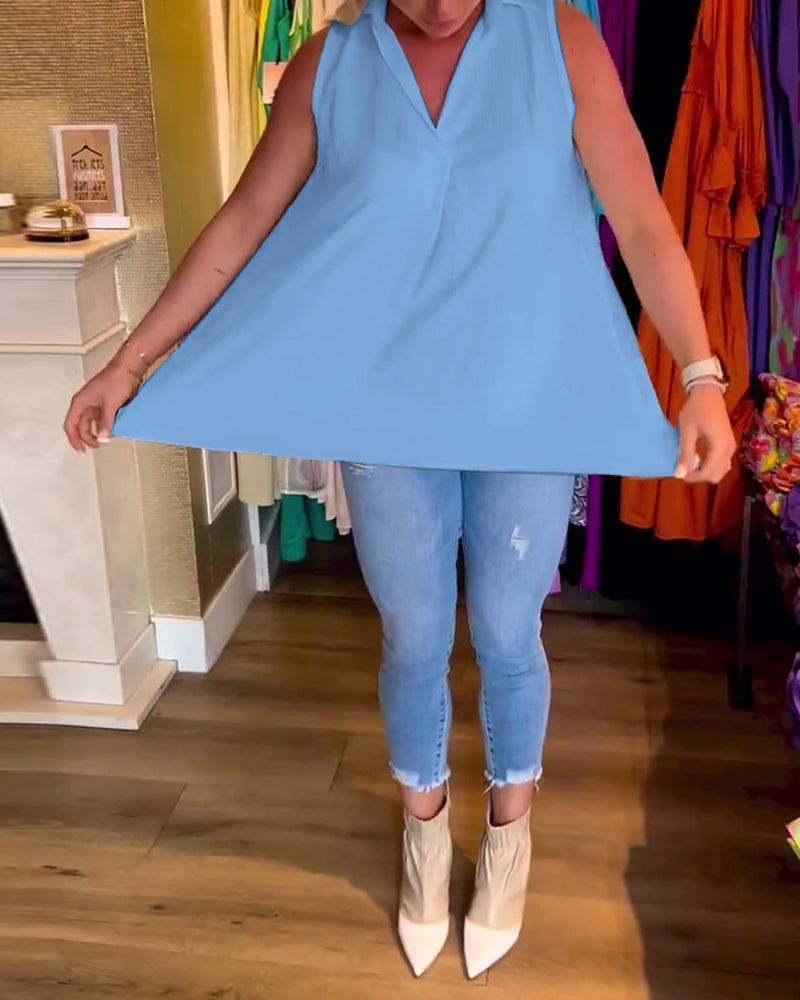 Anabella – Sleeveless Top with Ruffles and Lapels